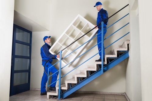 Ilford Man with Van team at a rubbish collection job preparing to load waste